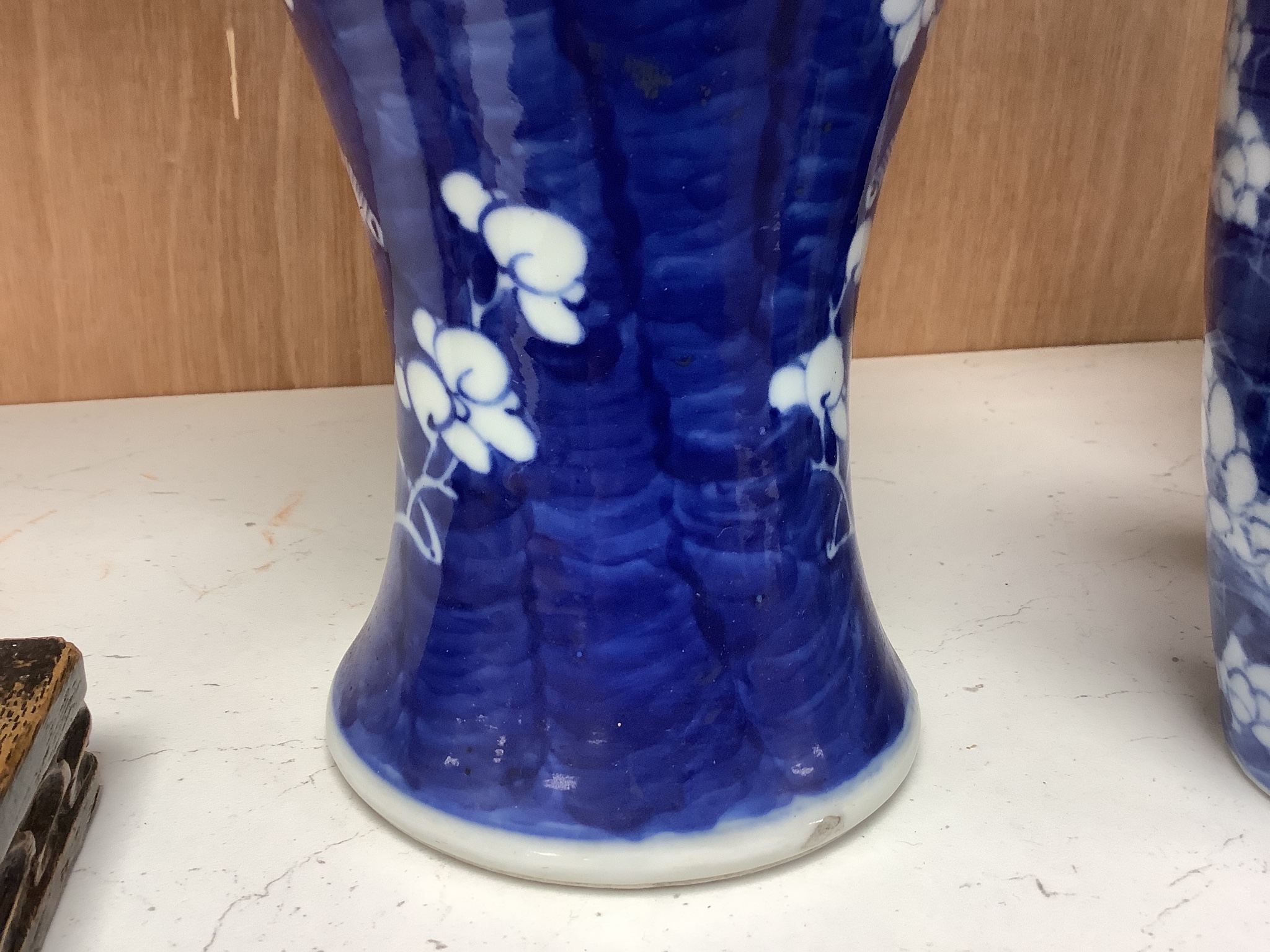 A pair of late 19th century Chinese prunus blossom baluster vases, 30cm, and a Japanese ovoid vase